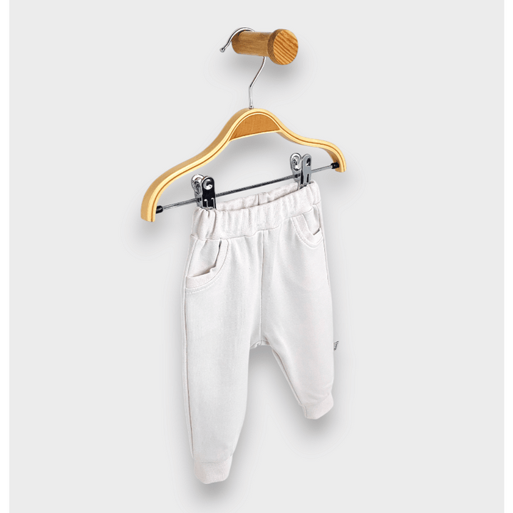 Rainy Pantaloni lungi pentru bebeluși cu buzunar 62-92 cm. ecru delicat